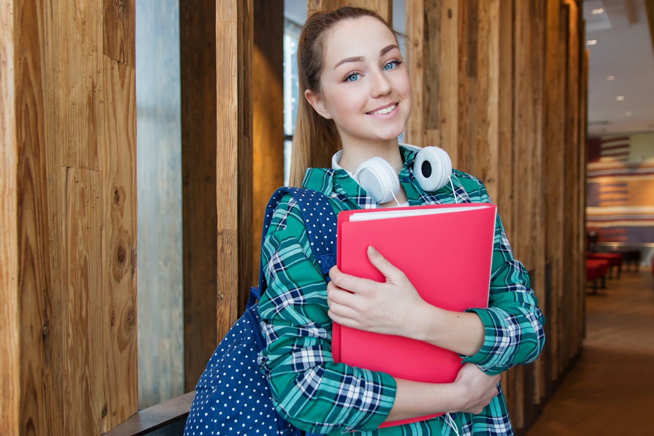 a lady holding a book